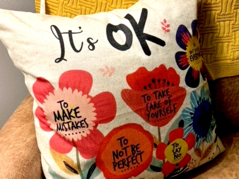 A pillow with a helpful saying on it in the Gurdon, AR calming room.